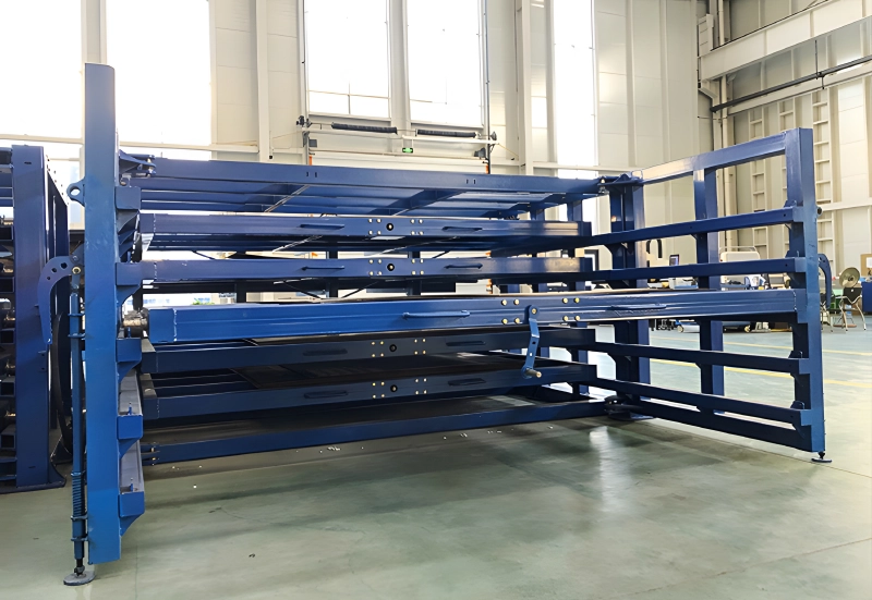 Blue heavy-duty sheet rack with manual crank handle mechanism in a clean factory