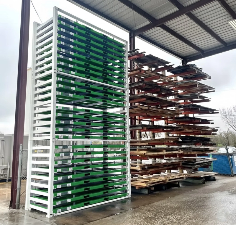 Modern white and green sheet rack next to old cantilever storage rack under canopy