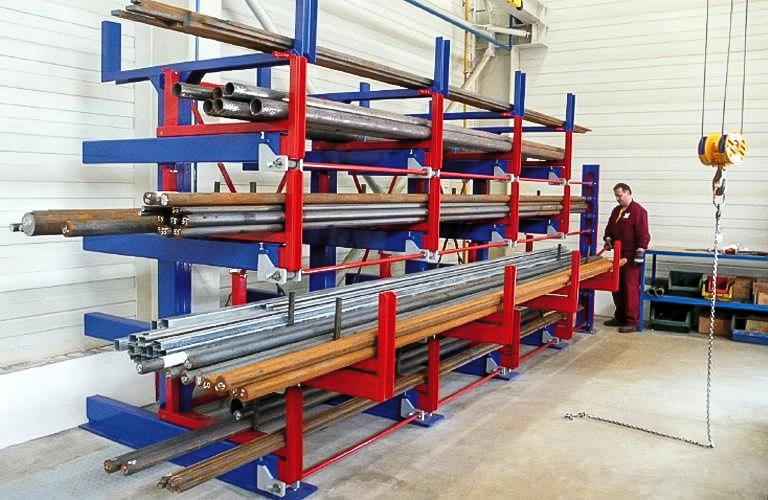 roll out cantilever rack efficient 2 Heavy-duty telescopic cantilever rack storing long steel pipes in warehouse, manual crank operation